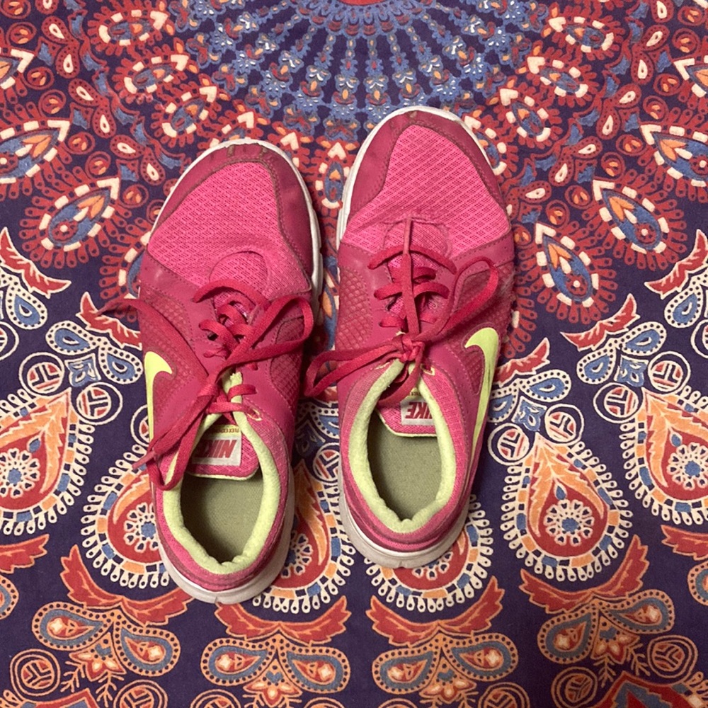 Pink and yellow Nike Flex Experience RN 2 sneakers